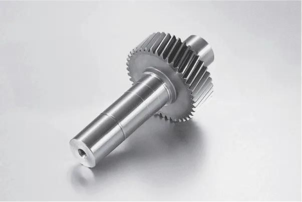 Transmission gears and shafts for torque transfer systems